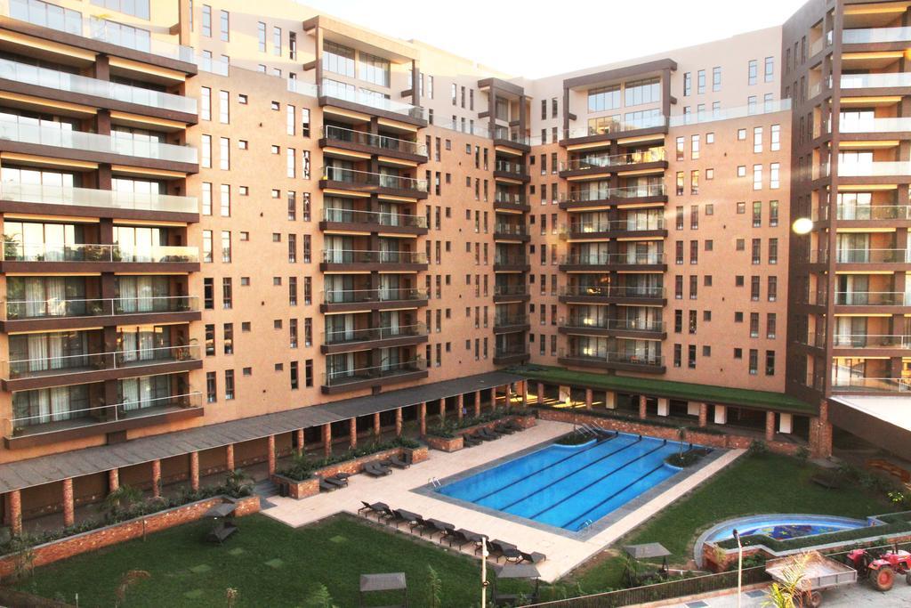 Speke Apartments Wampewo Кампала Екстериор снимка